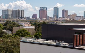 a view of the city skyline from the roof of a building